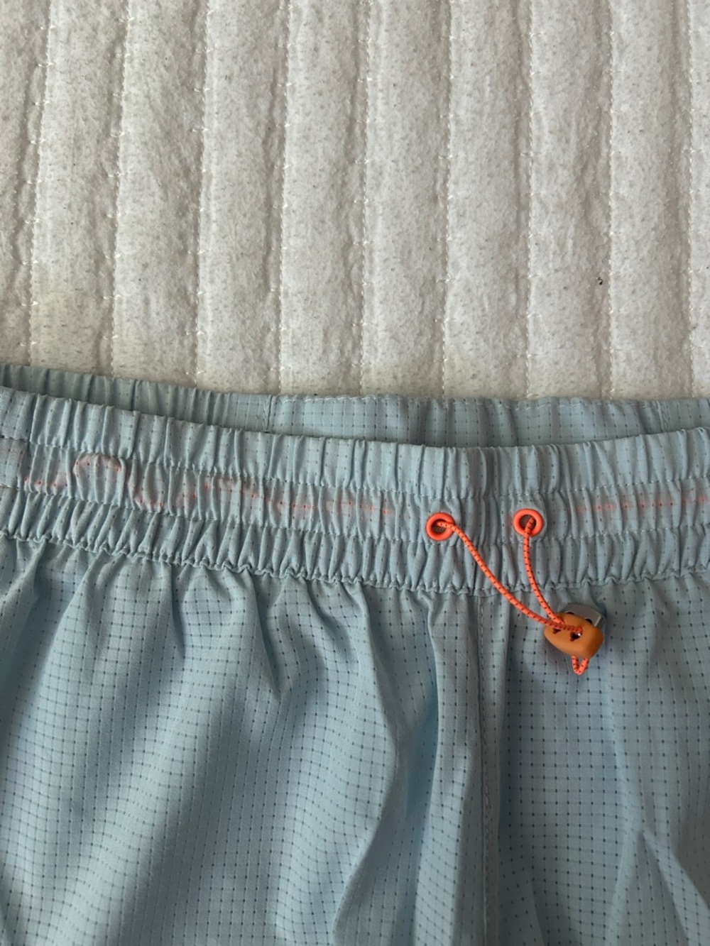 New Balance Light Blue Mesh Running Shorts with Orange Eyelets - Picture 7 of 8